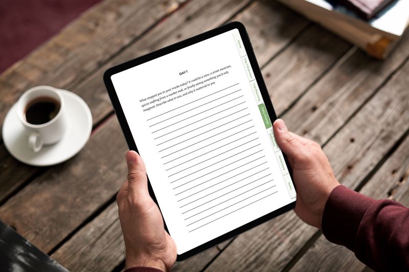 Essential Travel Journal E-Ink Edition showing a guided daily writing prompt on a tablet.