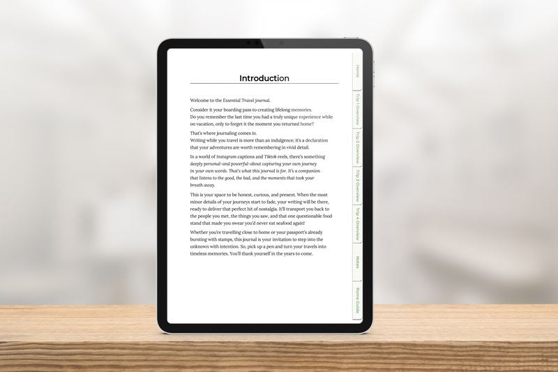 Essential Travel Journal E-Ink Edition showing the introduction page and hyperlink navigation on a tablet.